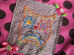 Fleecepulli mit Eule vorne