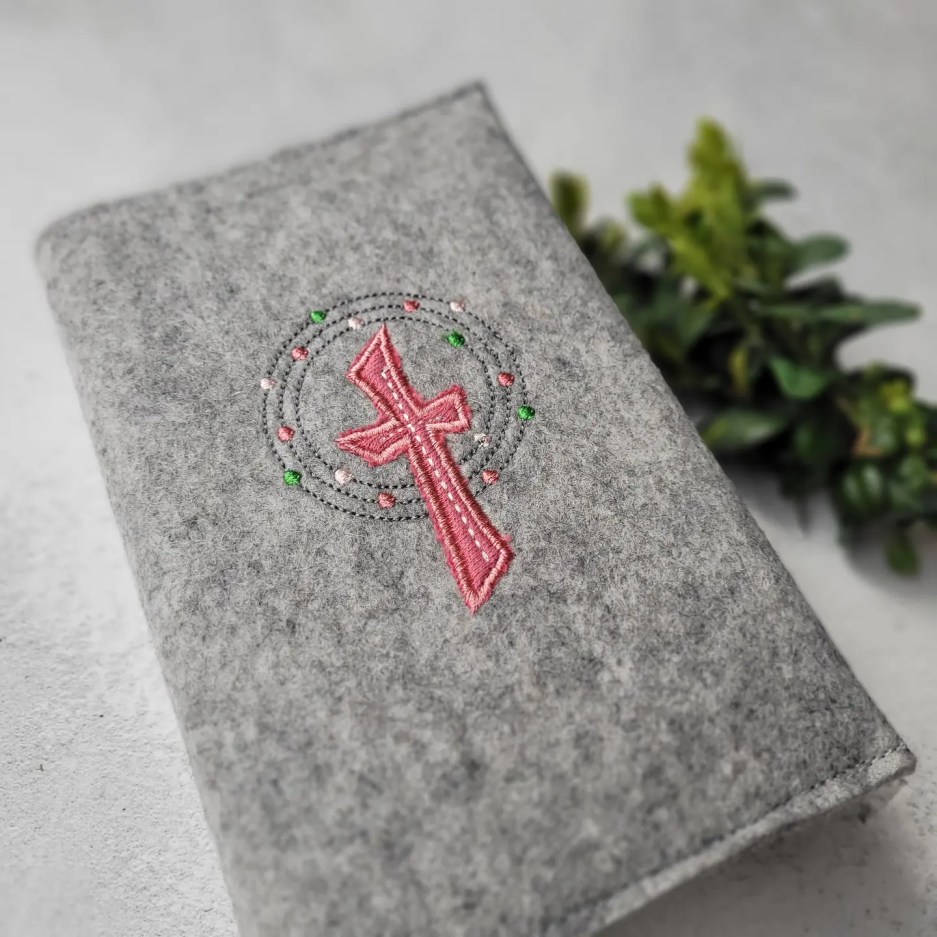 Gotteslobhülle Kreuz mit Kreisen rosa 