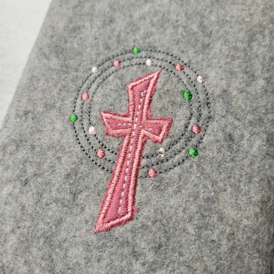 Gotteslobhülle Kreuz mit Kreisen rosa 